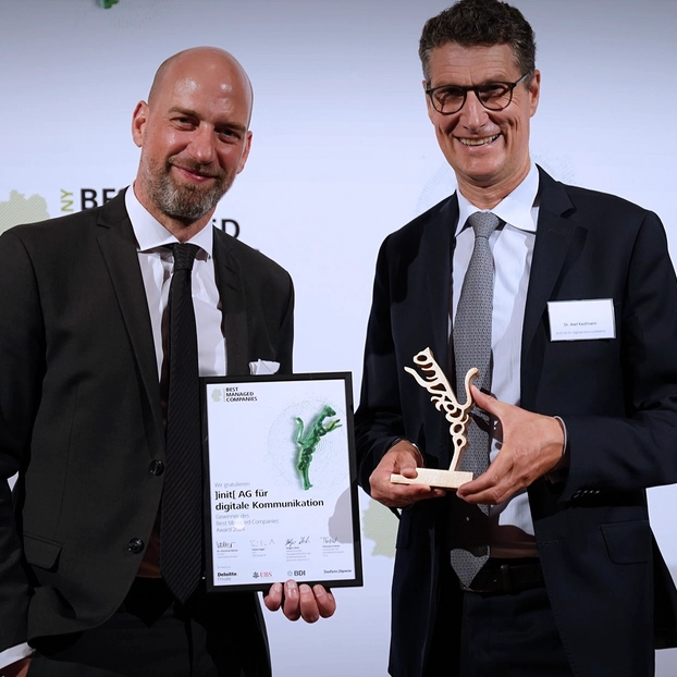 Harald Felling und Axel Kaufmann mit dem Award.